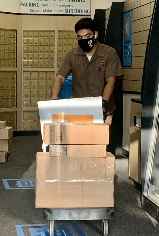 ups worker moving packages